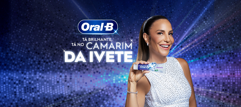 Banner do concurso Vem que é Oral-B da Oral-B em parceria com Ivete Sangalo. No centro da imagem, a cantora aparece sorrindo, usando um vestido branco de brilho, segurando uma escova dental Oral-B em destaque. Ao fundo, há um cenário em tons de azul e roxo com efeito de luzes e brilho. À esquerda, estpa o logotipo da Oral-B acompanhando do slogan (Tá brilhante Tá no Camarim da Ivete). À direita, há um paniel escuro com instruções numeradas de participação na ação: gravar um conteúdo usando o novo jingle (Vem que é Oral-B) publicar no instagram ou tiktok com a hashtag #VemQueÉOralB e concorrer à chance de conhecer Ivete Sangalo no Bloco do Brilho. Texto do site: experimenteoralb.com.br.